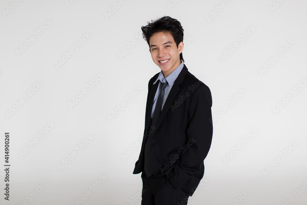 Young and handsome healthy Asian woman with a friendly smiley face and positive happy pose on a plain background. Concept for joy, proud, self-confident, and successful male in business and life Young and handsome healthy Asian woman with a friendly smiley face and positive happy pose on a plain background. Concept for joy, proud, self-confident, and successful male in business and life