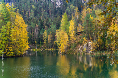 lake with reflection on autumn forest in the Czech Republic