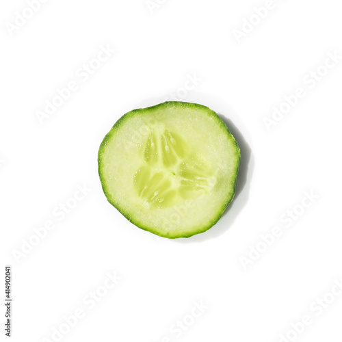 one sliced ​​Cucumber on a white background