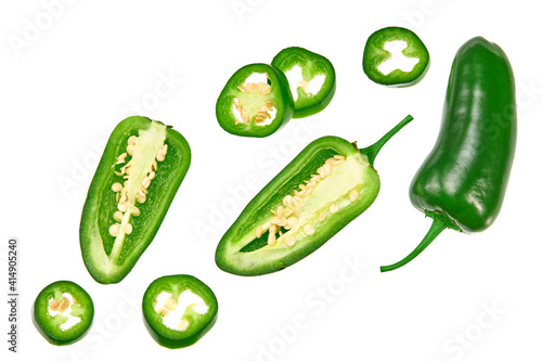 sliced jalapeno peppers isolated on white background. Green chili pepper. Capsicum annuum. top view photo