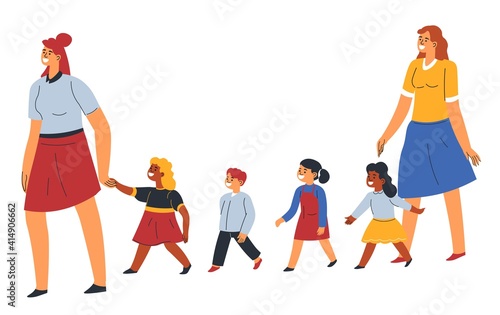 Teachers and children in kindergarten walking