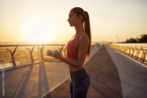 Girl doing sport outdoors in the morning