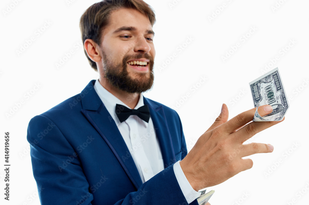 happy man with bundle of money and in classic suit on white background cropped view happy man with bundle of money and in classic suit on white background cropped view