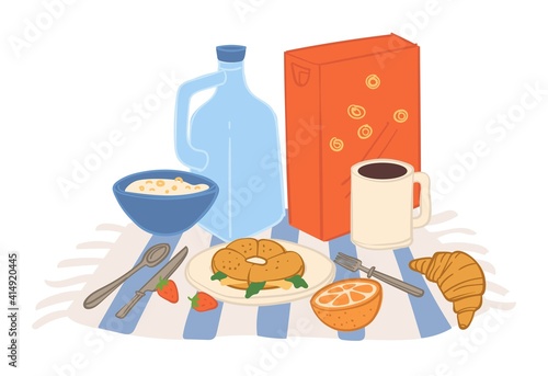 Food for picnic, milk and croissant with cutlery