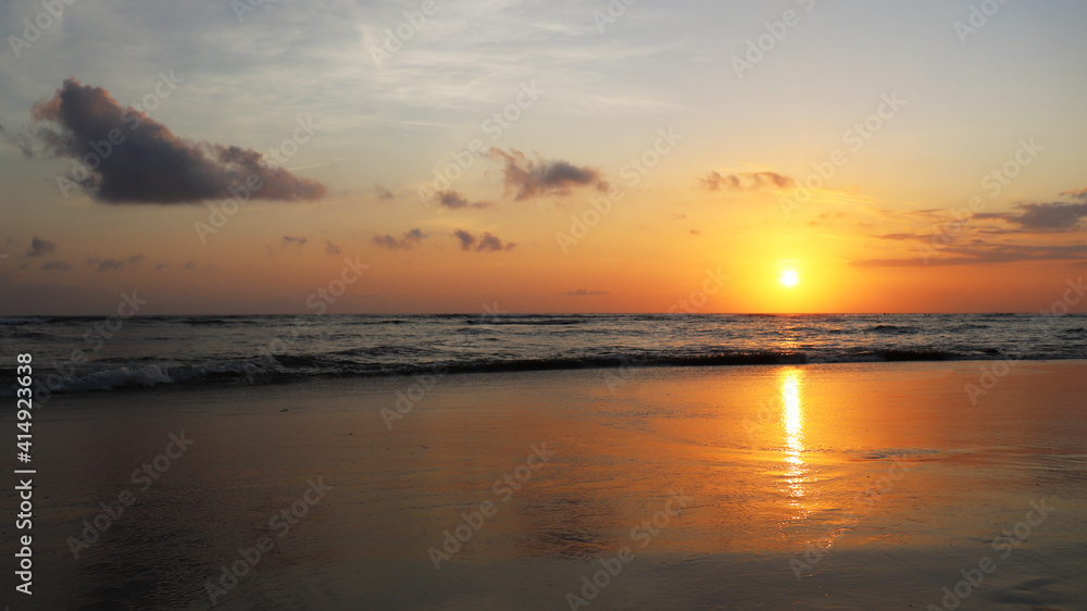 A perfect sunset scene at Jimbaran Beach Bali Indonesia