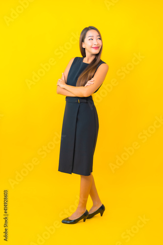 Portrait beautiful young asian business woman smile with action