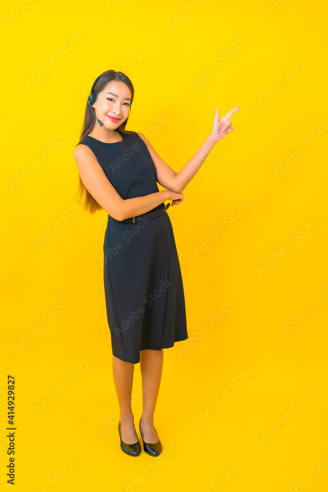 Portrait beautiful young asian business woman with headset call center customer care Portrait beautiful young asian business woman with headset call center customer care