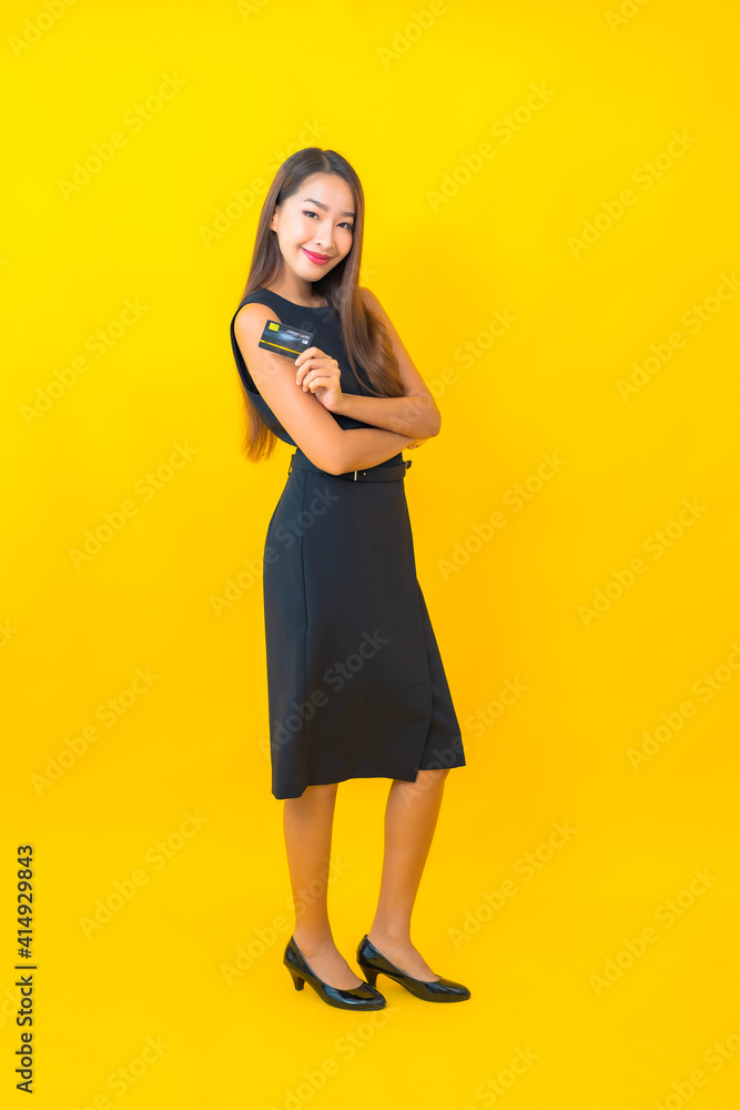 Portrait beautiful young asian business woman with credit card Portrait beautiful young asian business woman with credit card