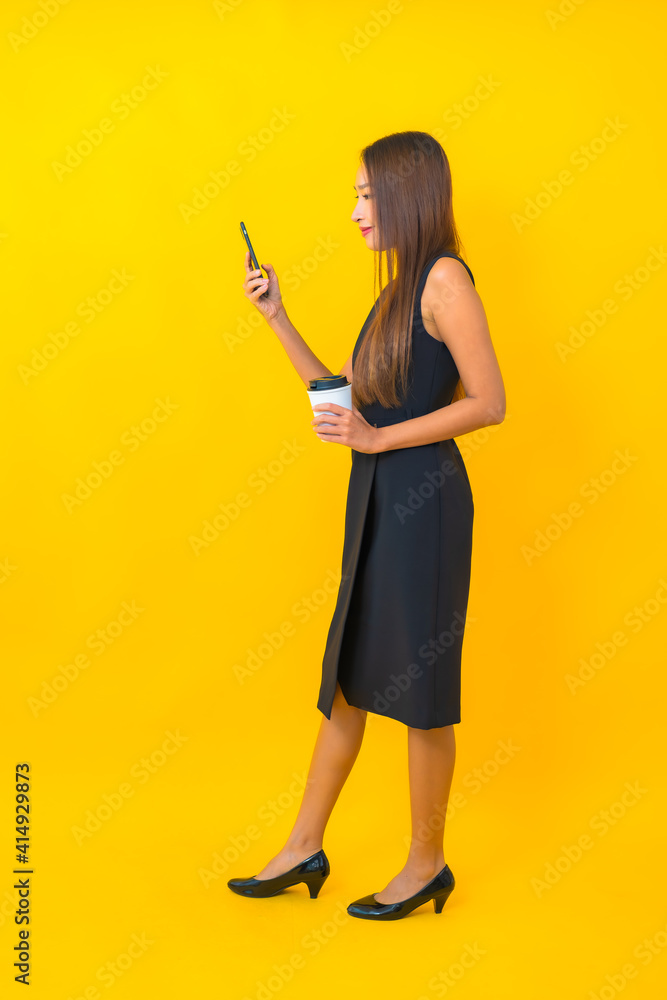 Portrait beautiful young asian business woman with coffee cup and smart mobile phone Portrait beautiful young asian business woman with coffee cup and smart mobile phone