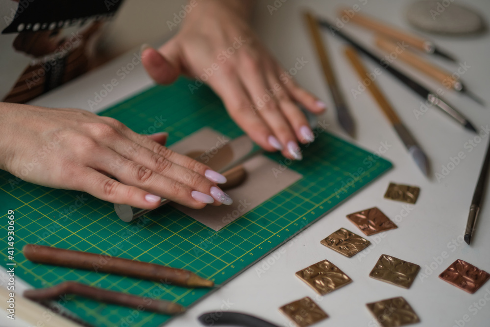 Craft jewelery making with professional tools. A handmade jeweler process, manufacture of jewellery. Craft jewelery making with professional tools. A handmade jeweler process, manufacture of jewellery.