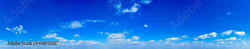 Blue Sky background with tiny Clouds. Panorama background