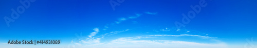 Blue Sky background with tiny Clouds. Panorama background