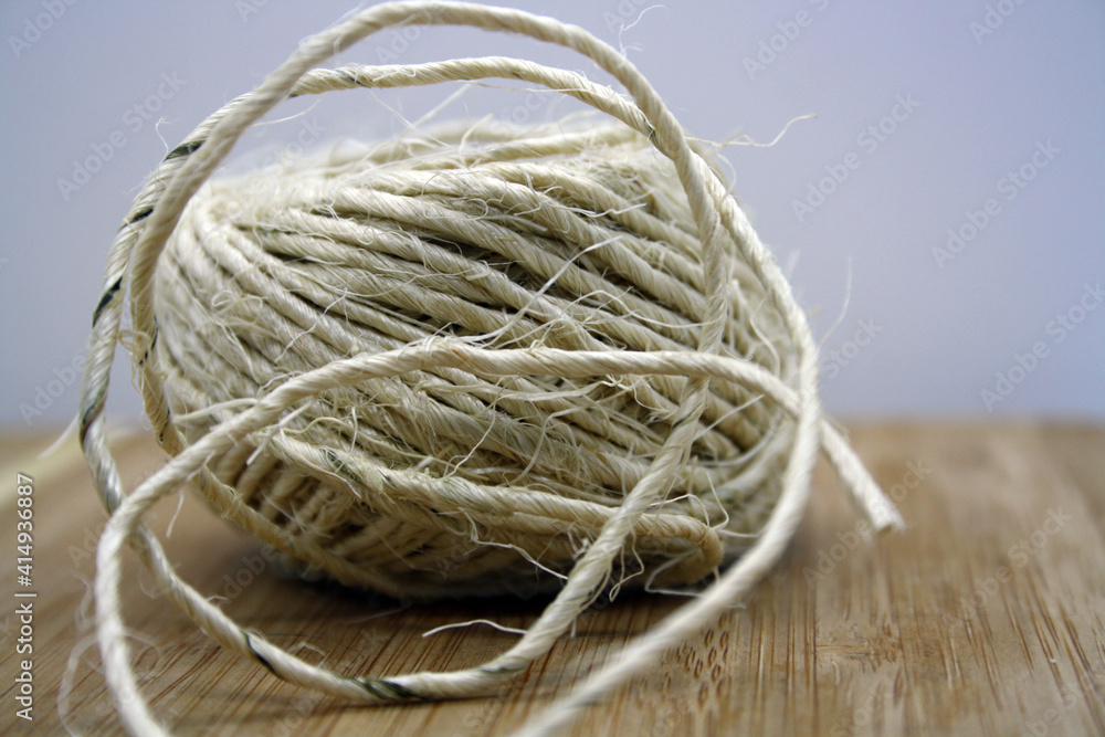 Twine for tying plants on a white background.