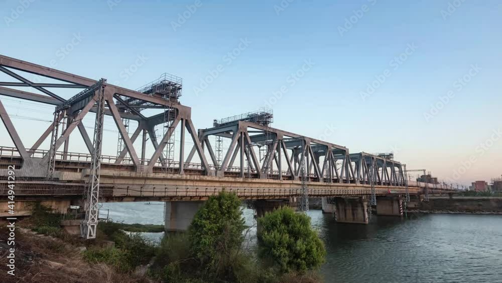 Video of high-speed rail driving on the bridge from day to sunset Video of high-speed rail driving on the bridge from day to sunset