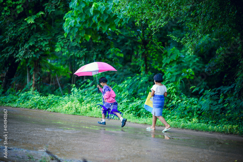 couple walking in the rain