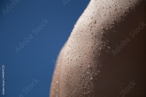 Drops of water on the human skin