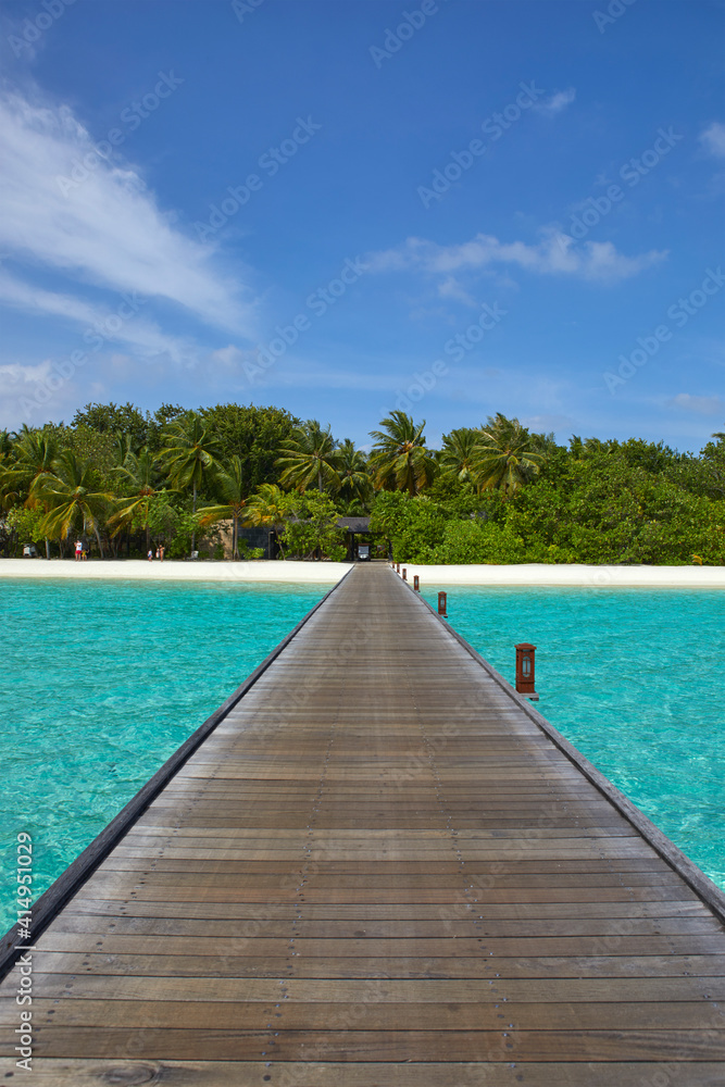 Footbridge of Paradise Island (Lankanfinolhu) at sunset, Maldives