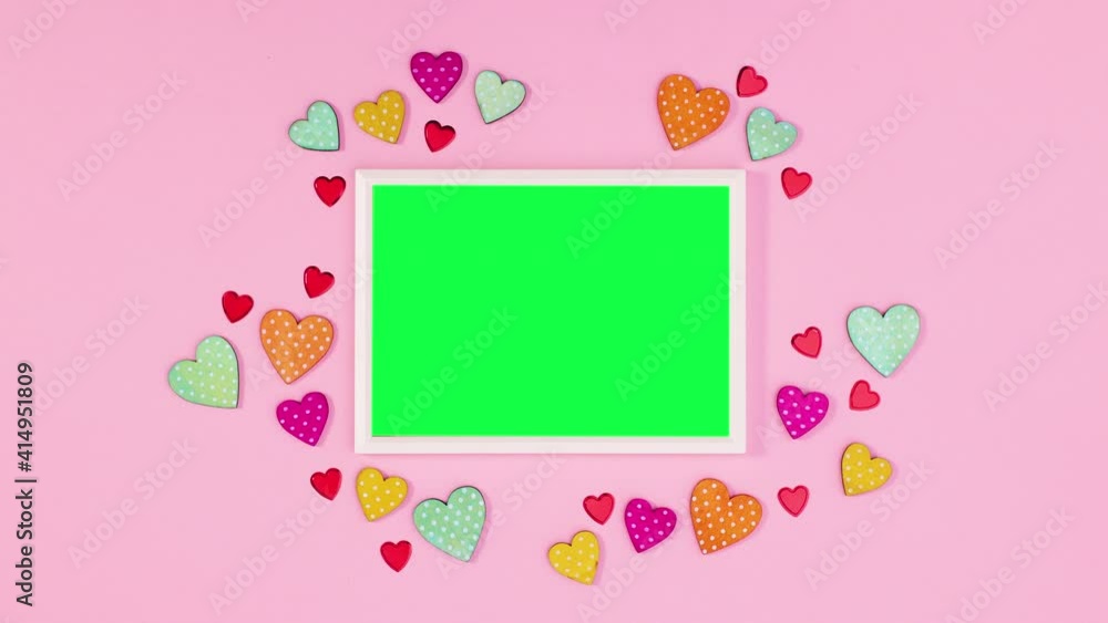 Wooden hearts around frame with green screen. Stop motion Wooden hearts around frame with green screen. Stop motion