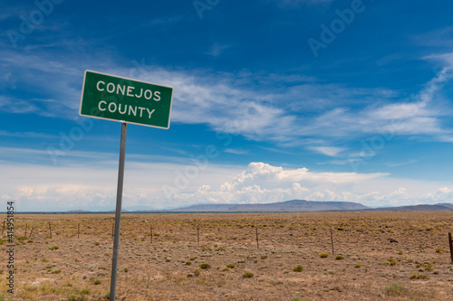 A Conejos County sign along US highway 285, in the State of Colorado, USA