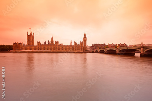 Palace of Westminster at sunset  viewed from across the river Thames  London  UK