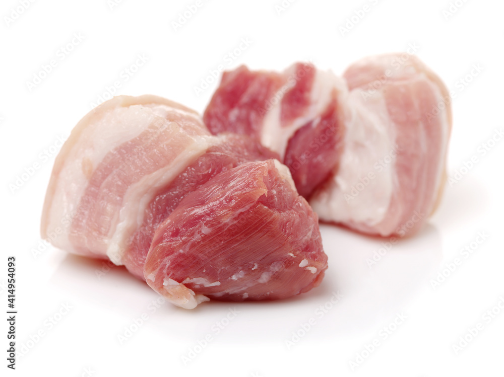 Raw pork belly pieces on a white background Raw pork belly pieces on a white background