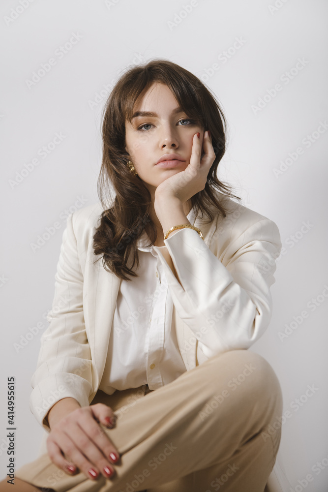 Lady in White Suit On Bright Background Lady in White Suit On Bright Background