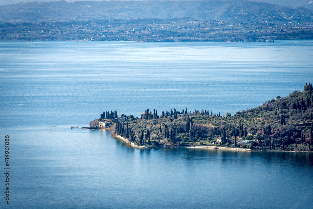 Aerial view of Punta San Vigilio. Promontory of Lake Garda near the small town of Garda view from the Rocca di Garda, small hill overlooking the lake. Verona province, Veneto, Lombardy, Italy, Europe