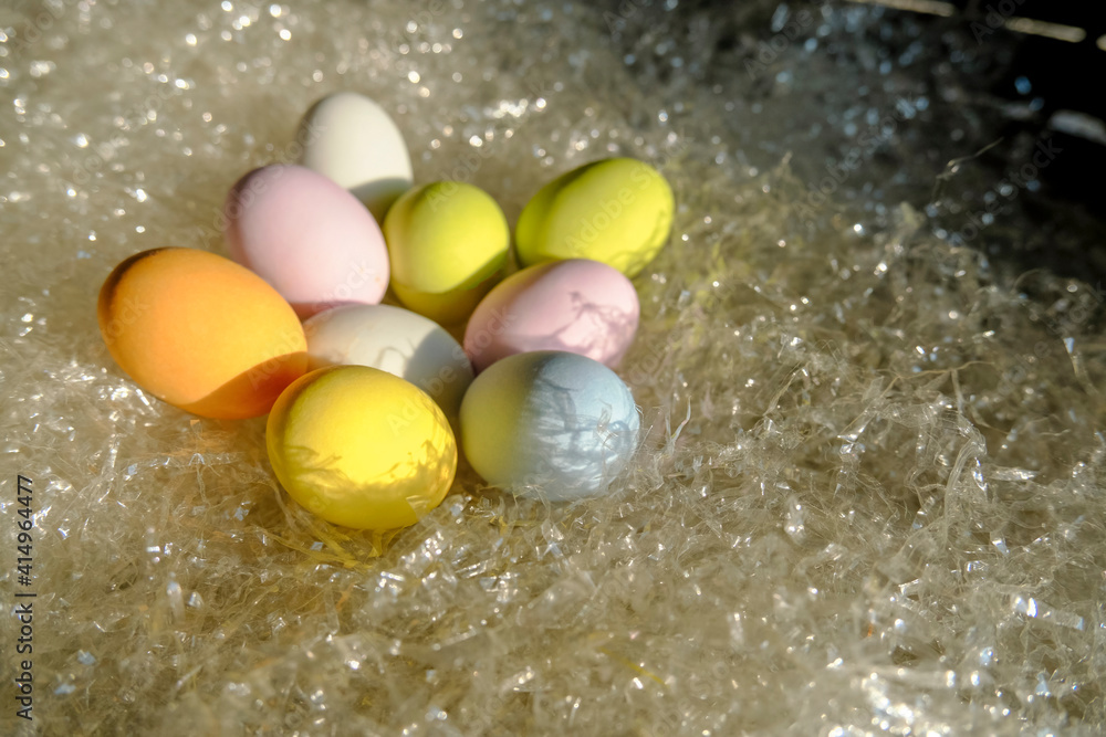 Colorful pastel Easter eggs in basket close-up. Copy space. easter holidays card Colorful pastel Easter eggs in basket close-up. Copy space. easter holidays card