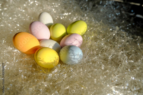 Colorful pastel Easter eggs in basket close-up. Copy space. easter holidays card