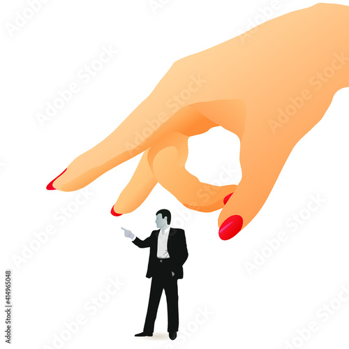 Woman`s flick on a  little figure of businessman