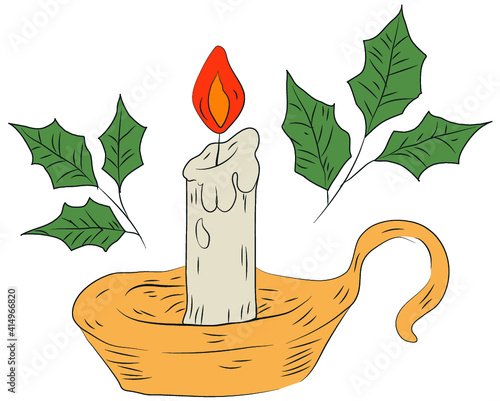 Christmas candle in a candle holder