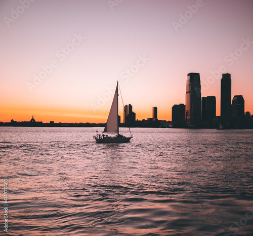 landscape summer coast sea horizon city sky colors orange boat sailboat people life buildings 