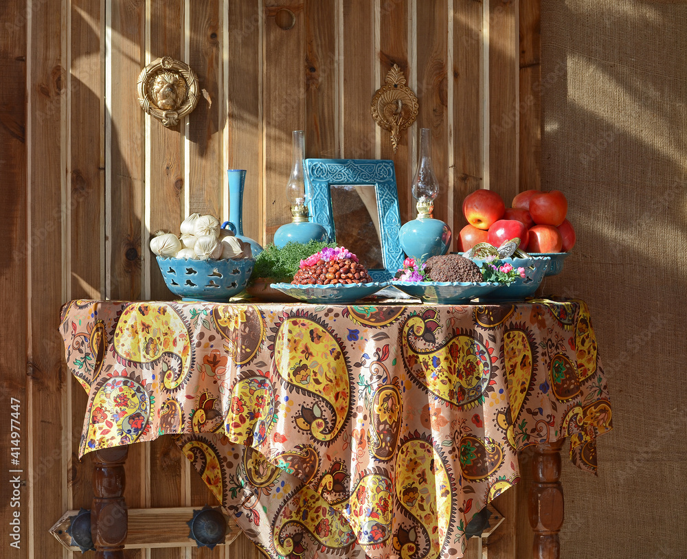 Haft-Seen, traditional table setting of Nowruz, the traditional Iranian ...