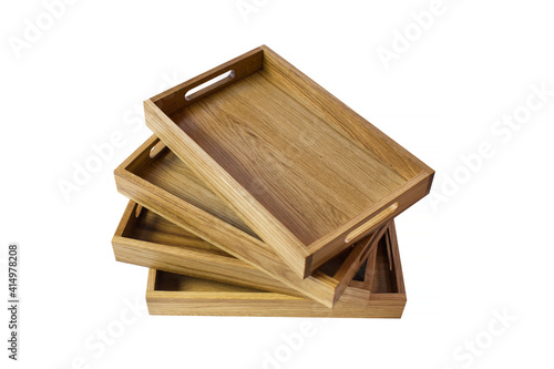 Fototapeta Naklejka Na Ścianę i Meble -  Wooden box for storage food. Dish tray for restaurant. Transportation. Isolated wooden packaging tray . Wooden serving tray in hotel or restaurant. Container for dishes.

