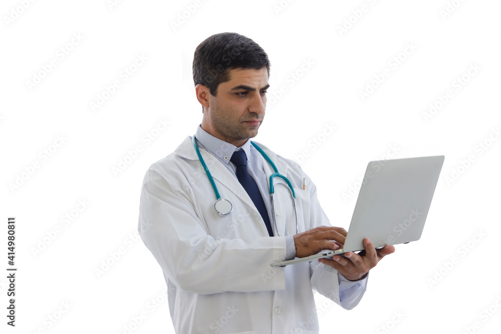 male doctor puts a stethoscope on his neck and holding laptop look to screen monitor isolated male doctor puts a stethoscope on his neck and holding laptop look to screen monitor isolated
