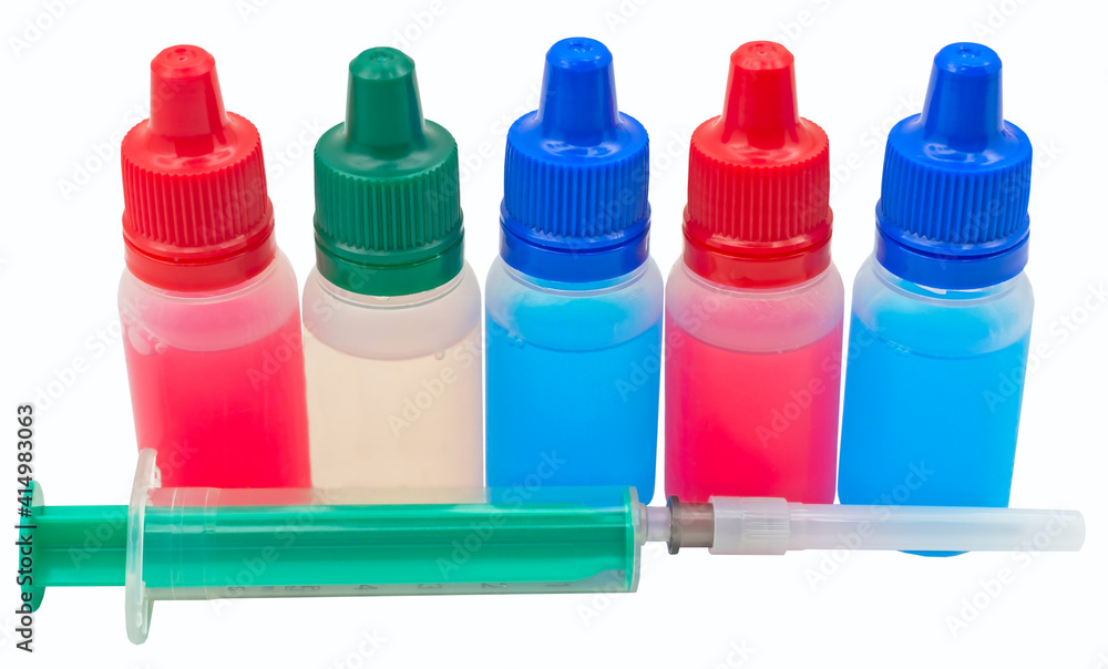 Medical syringe and vials isolated on white Medical syringe and vials isolated on white
