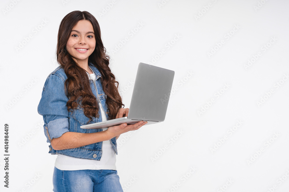 Confident smiling young teen girl with laptop isolated over white background Confident smiling young teen girl with laptop isolated over white background