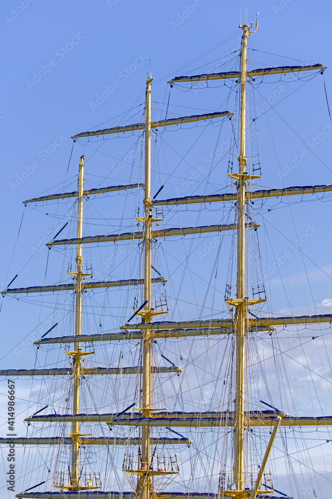 Masts and rigging of a sailing ship against sky Masts and rigging of a sailing ship against sky