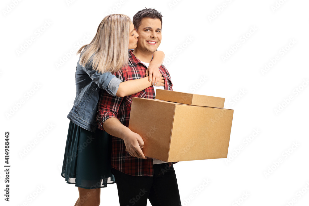 Girlfriend and boyfriend kissing and moving into a new home Girlfriend and boyfriend kissing and moving into a new home