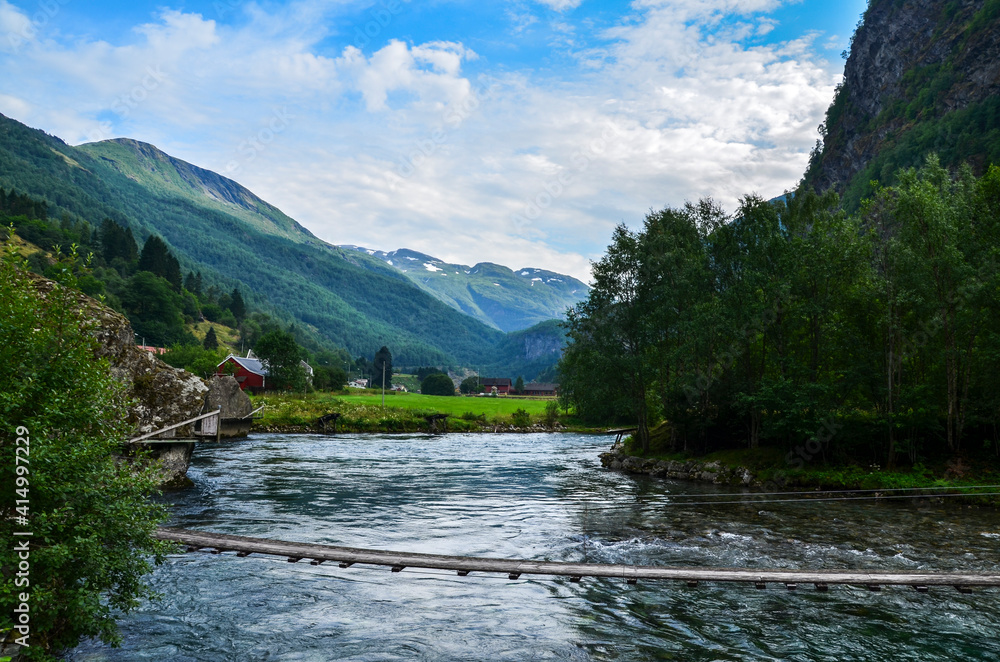 Beautiful Norwegian landscape with mountain pure cold water river and amazing fjords on background, near Flam, Norway Beautiful Norwegian landscape with mountain pure cold water river and amazing fjords on background, near Flam, Norway