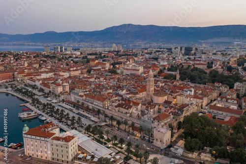 Aerial drone shot of Diocletian Palace in old town split with empty riva street befor sunrise in morning in Croatia © Davidzfr