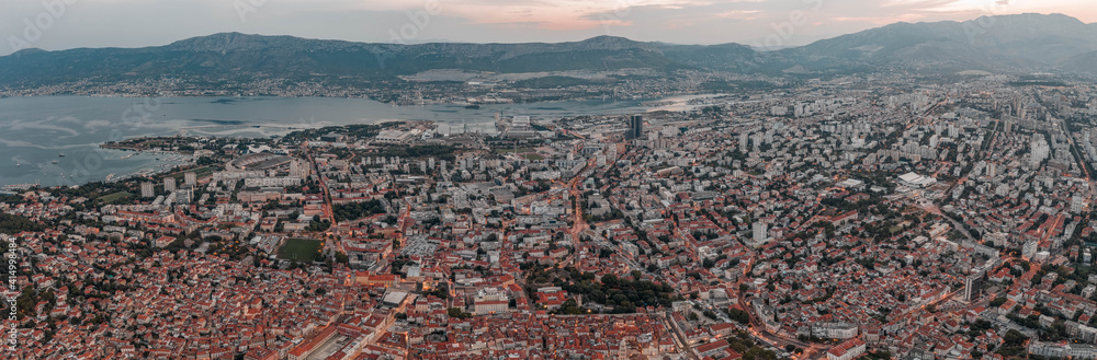 Aerial panoramic drone view of Split new town before sunrise in morning in Croatia