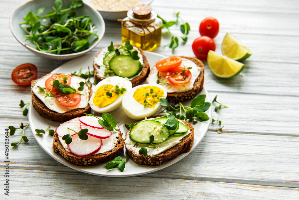 Sandwiches with healthy vegetables and micro greens