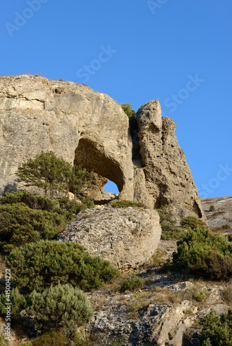 Scenic view through mountain grotto Aeolian Harp, Sudak, Crimea, Russia.