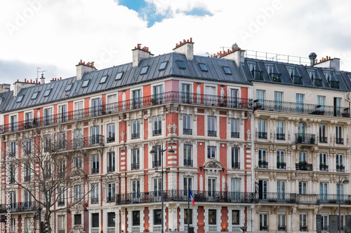 Paris, an ancient wooden door, typical building in the center 