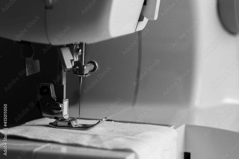 sewing machine in black and white mode, slow fashion and home sewing concept
sewing machine in black and white mode, slow fashion and home sewing concept