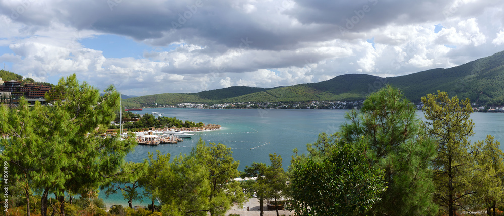 Turkey, Bodrum, October 2020. Beautiful seascape. Sea, mountains, yachts and buoys. Rest in Turkey. Panorama.
