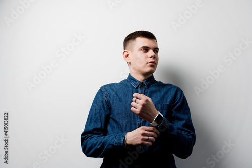 Confident business man on white background. Working on-line at home. © Rabizo Anatolii