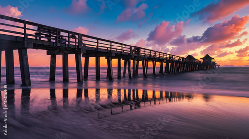 sunset at the old pier naples, Florida, united states of america.. Travel concept. © emotionpicture