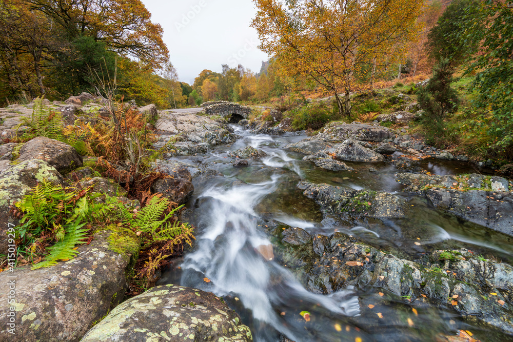 Ashness Bridge and river in autumn, Lake District National Park, Cumbria Ashness Bridge and river in autumn, Lake District National Park, Cumbria